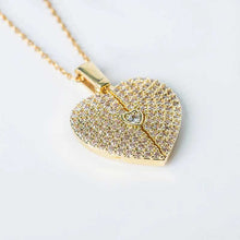 Elegant gold open close heart necklace